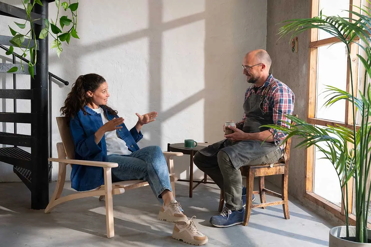 Woman and man having a coffee break