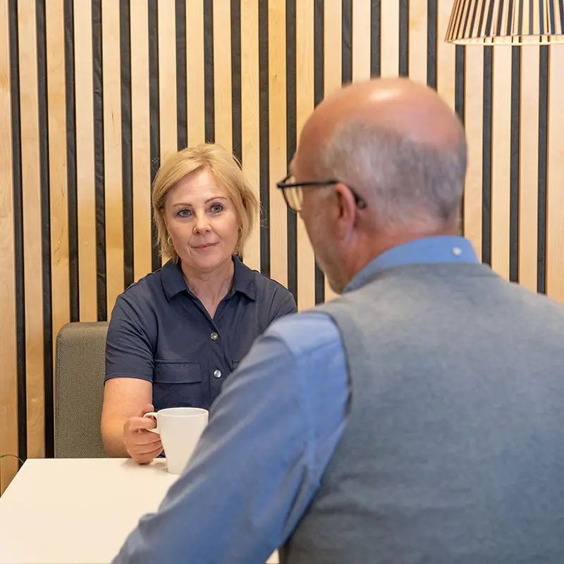 Two people discussing with each other