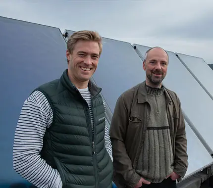 Olav Feby og Kjetil Sandholm smiler til kamere