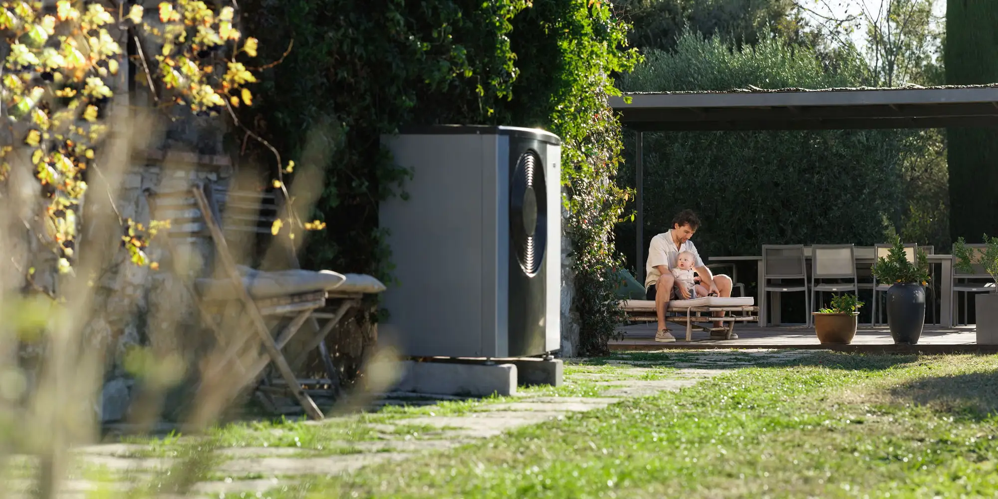 Image of S2125 outside with family in the background